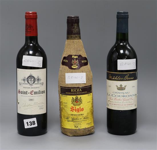 One Chateau La Couronne, 1994, a bottle of Rioja Siglo 1992 and a bottle of Saint Emilion Private Reserve 2001